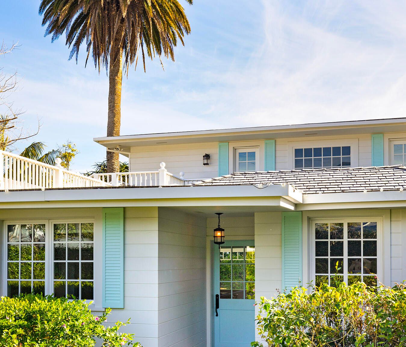 Remodeled kitchen with quartzite counters and pendant lights